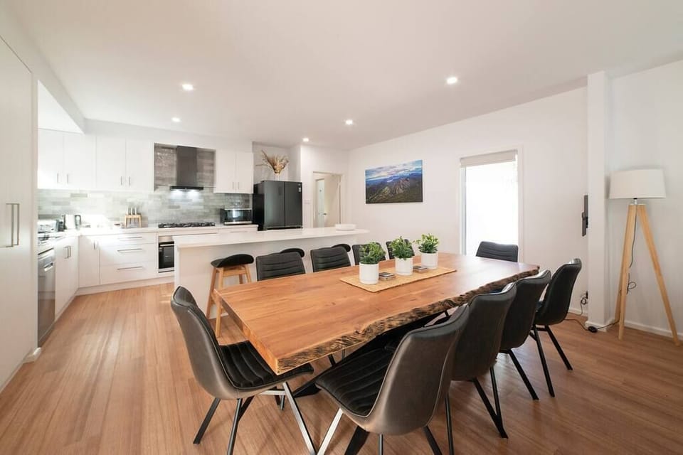 Host gatherings in our dining area for 10, plus 3 bench spaces.