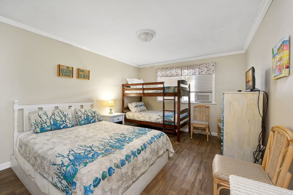 Bedroom 2, with a comfortable Queen Bed and Twin Bunks is a great place for up to 4 for get a good night rest