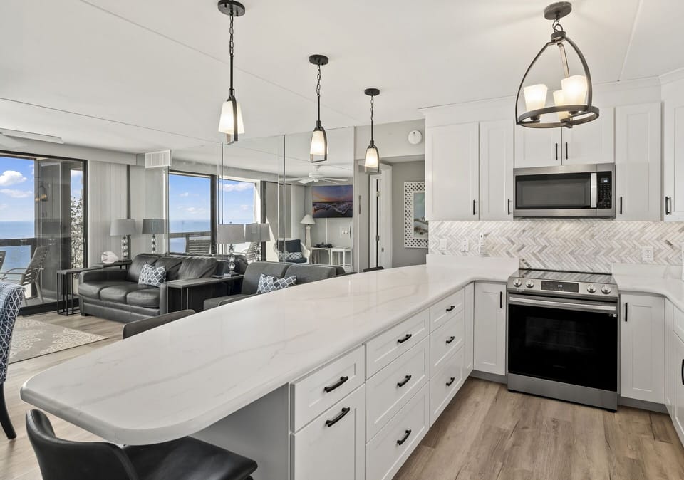 This gorgeous Kitchen is open to the entire Living & Dining area!