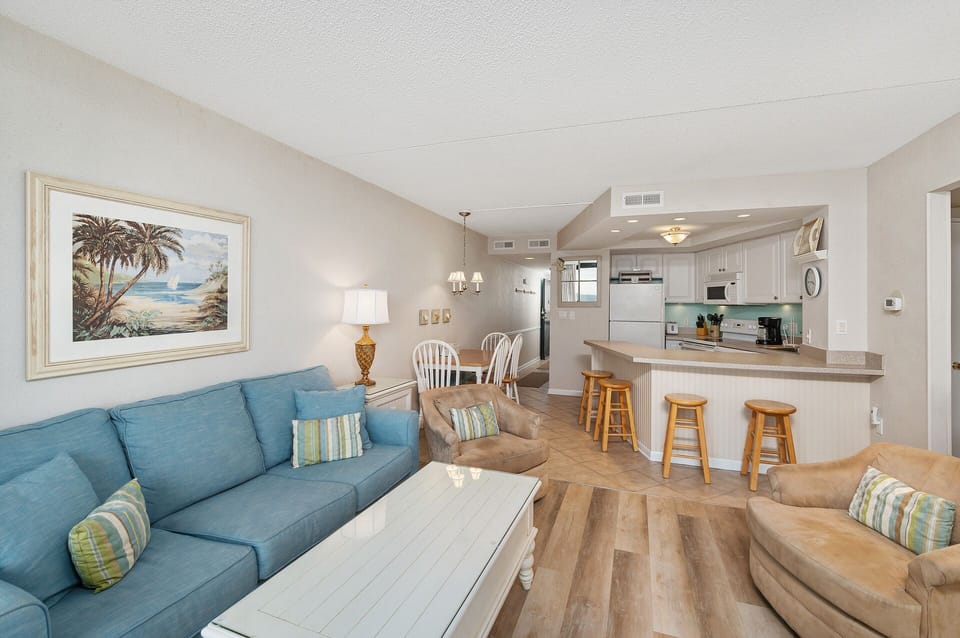 Adorned in Colors of Sands & Sea with Flooring reminiscent of Driftwood.