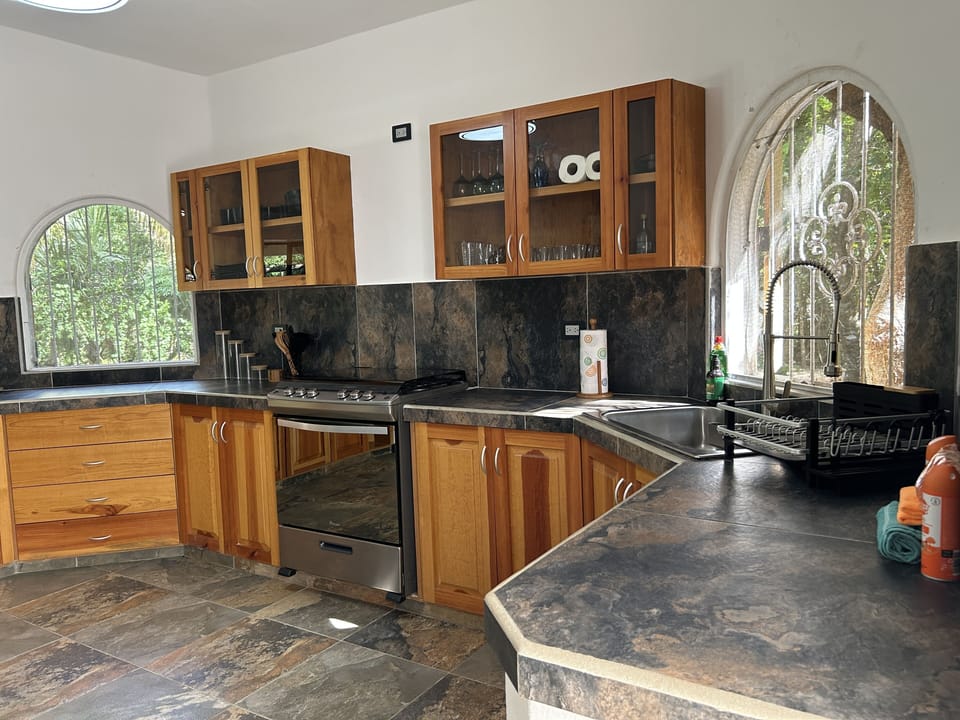 The kitchen with gas oven and stovetop