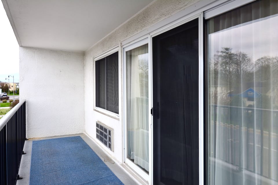Balcony off the livingroom provides views of Rehoboth Avenue.