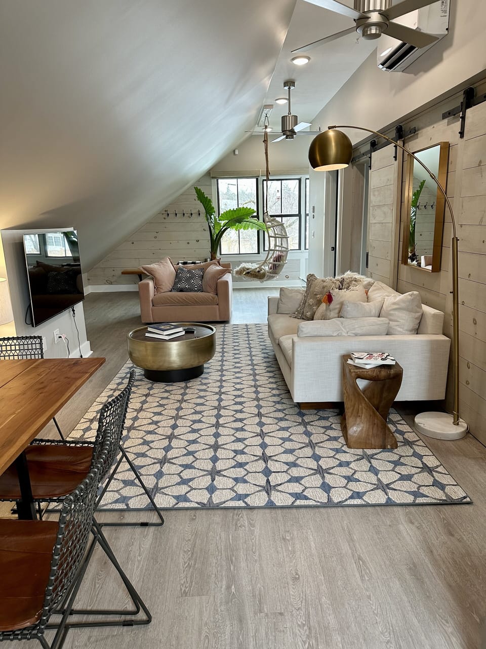 Cozy open plan living/dining/kitchen area with views to the fenced in back yard