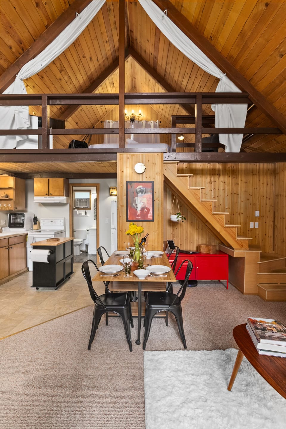 Loft bed is accessed from stairs. Second bedroom is on ground floor.