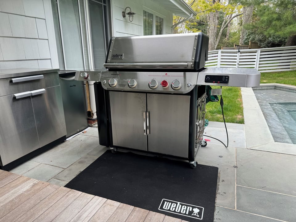 Outdoor dining with new Weber grill. 