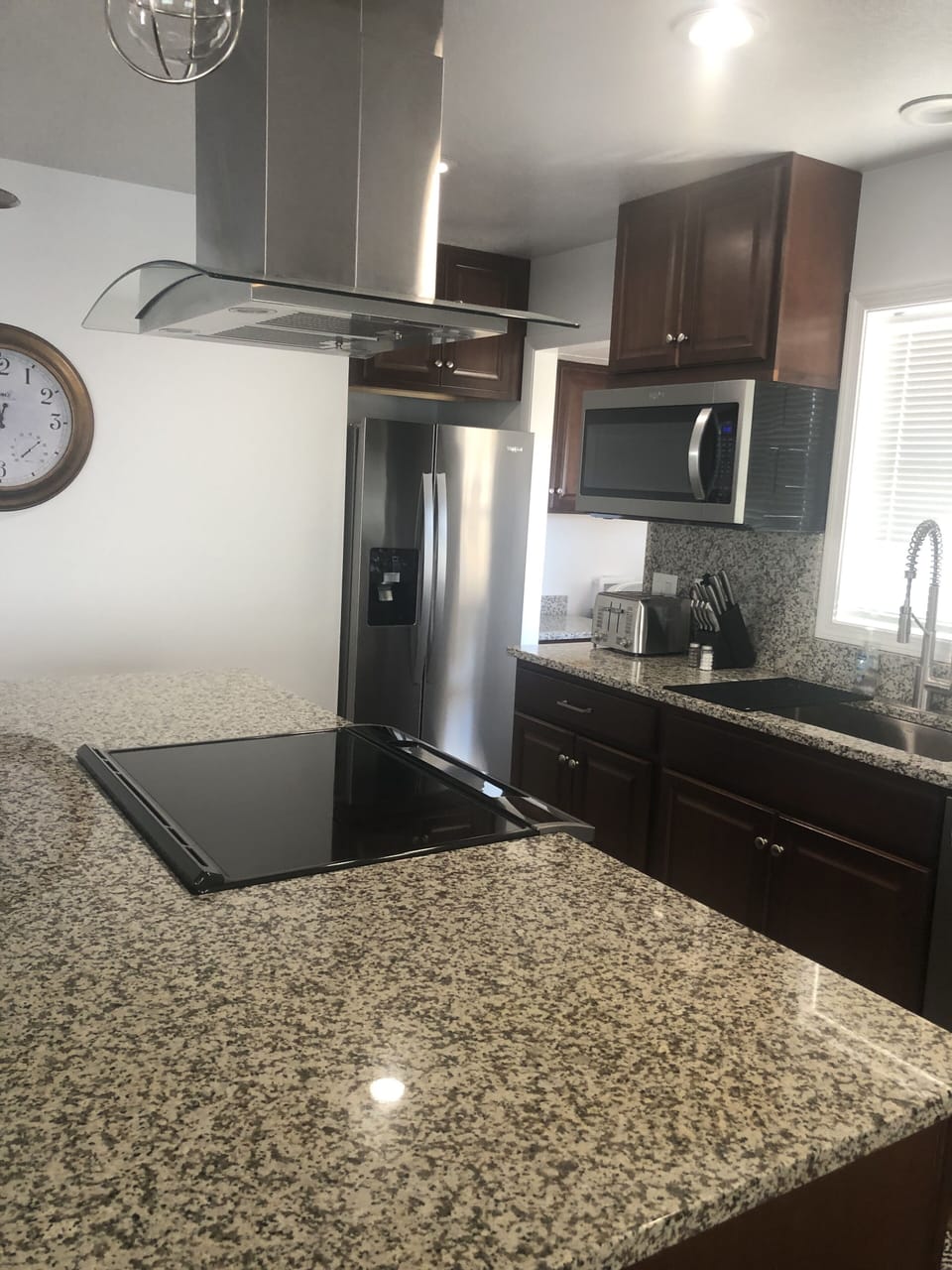 Update Kitchen with new  cabinets, appliances, and granite counter