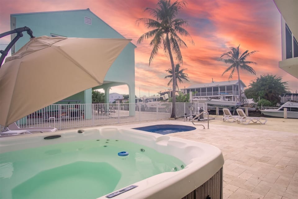 Enjoy the outdoors in your own private hot tub and adjacent pool!
