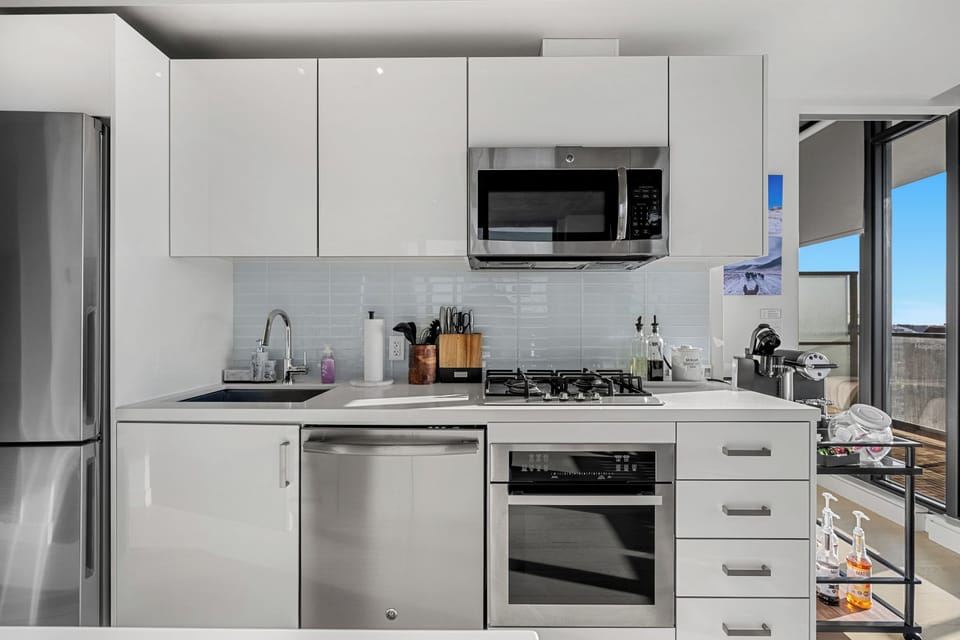 Guests will enjoy two bathrooms, two bedrooms and an open floor plan, including a dining area, coffee bar, large patio, complete with furniture and BBQ, and more! 