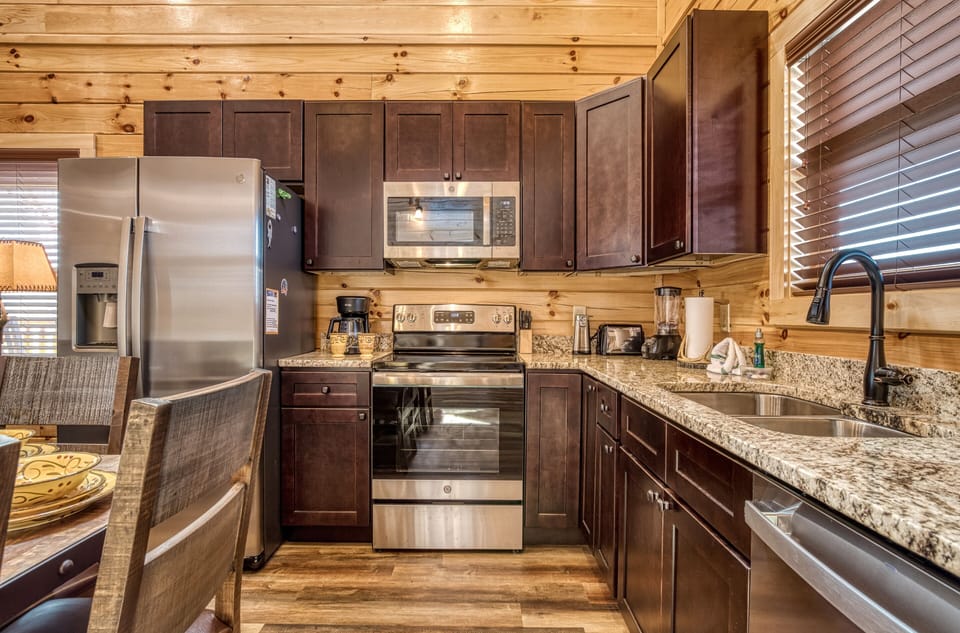 Smoky Mountain Cabin with Pool - "Blue Bear Splash" - Fully furnished kitchen with stainless steel appliances and granite countertops