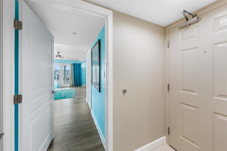 At the end of the Hall, you will find the Luxurious Primary Suite.