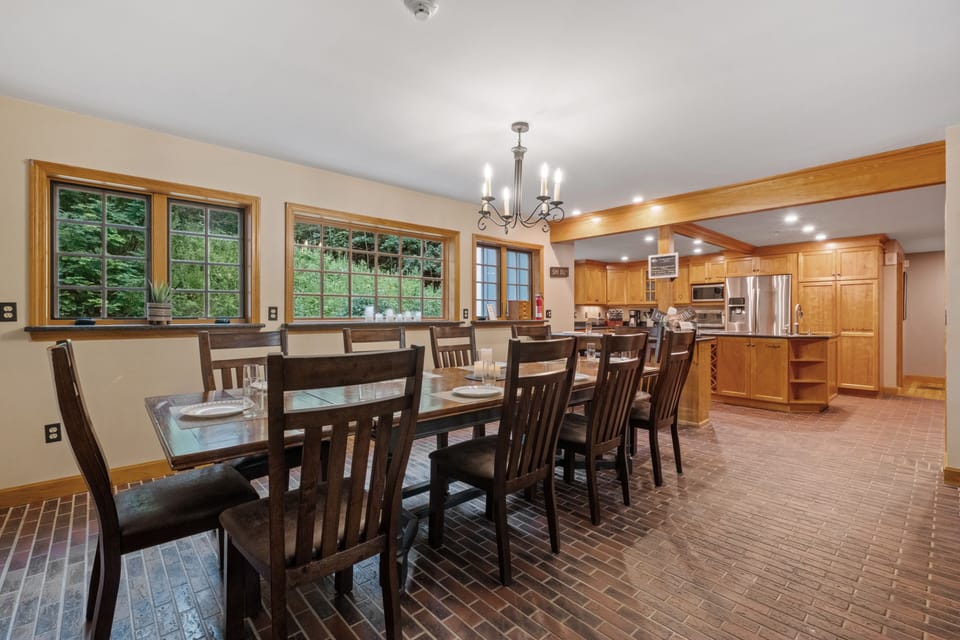 Additional view of the dining table and kitchen