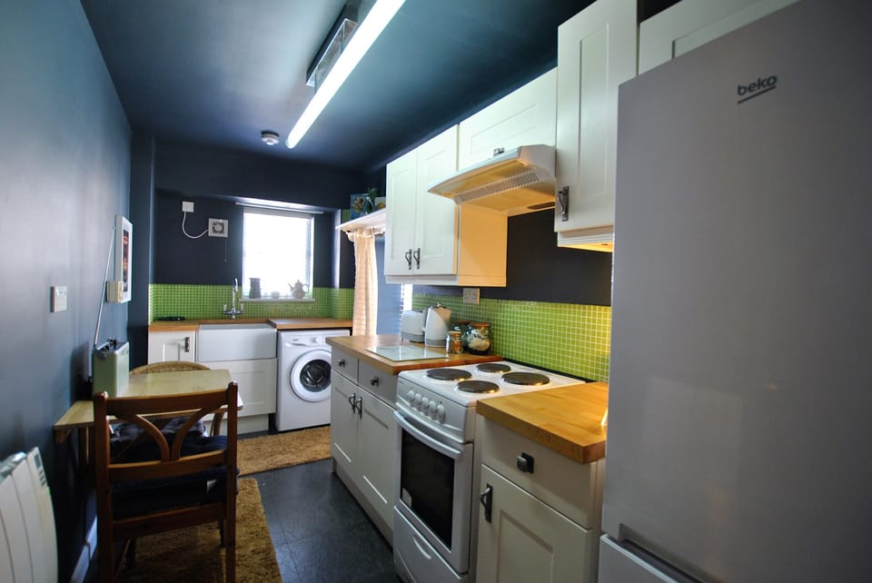 The kitchen has an area for dining