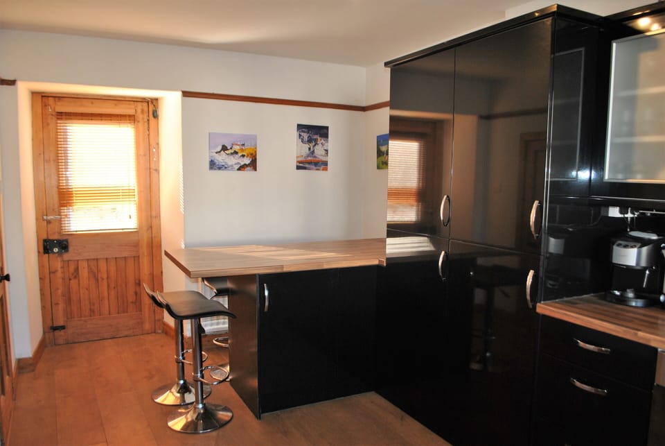 Space to eat at the dining table in the fitted kitchen