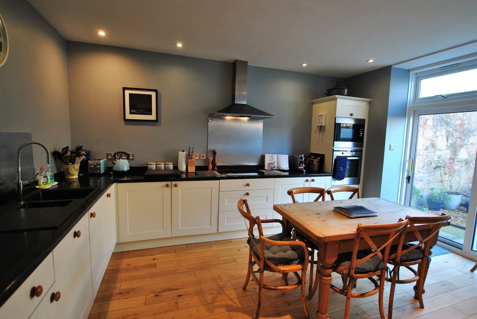 The modern kitchen spacious and well equipped