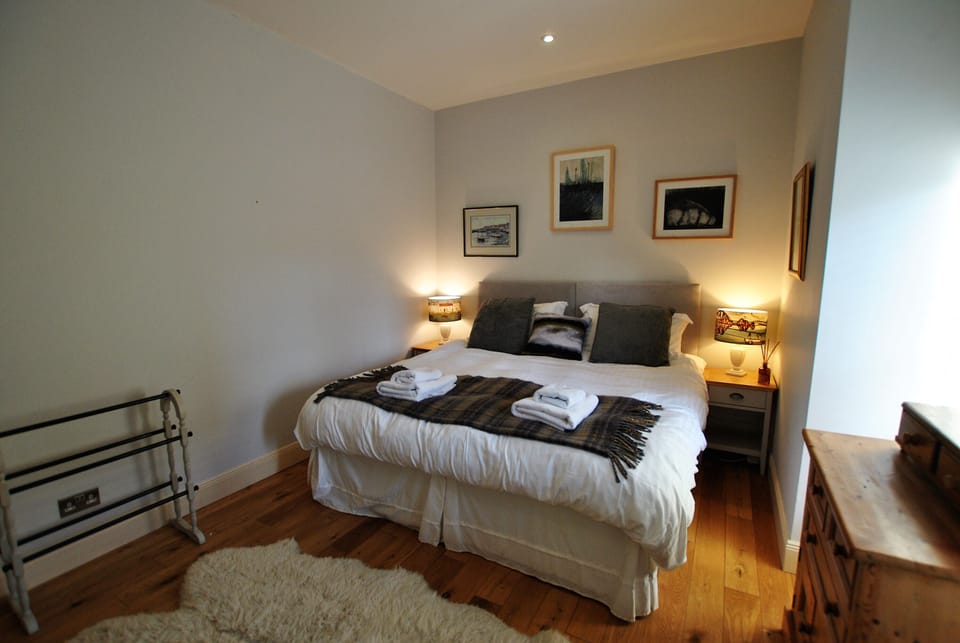 The king bed can be arranged as a twin on request