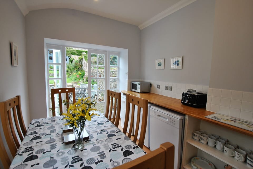 The dining room leads out to the garden