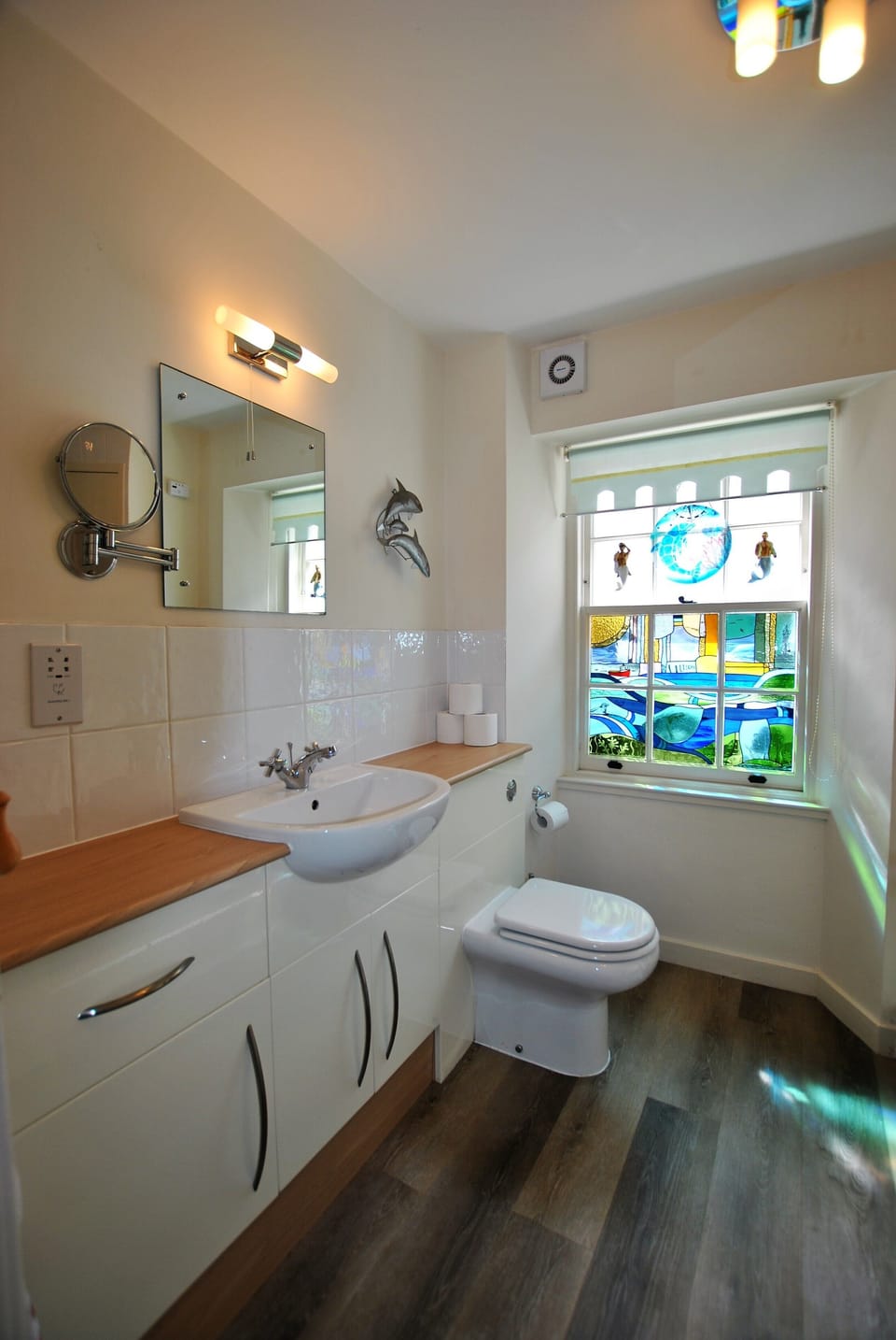 The shower room is bright and modern