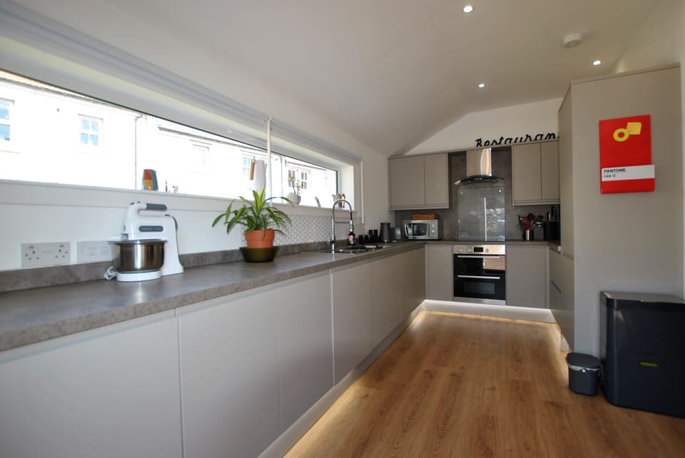 Enjoy the light streaming in through the long kitchen window