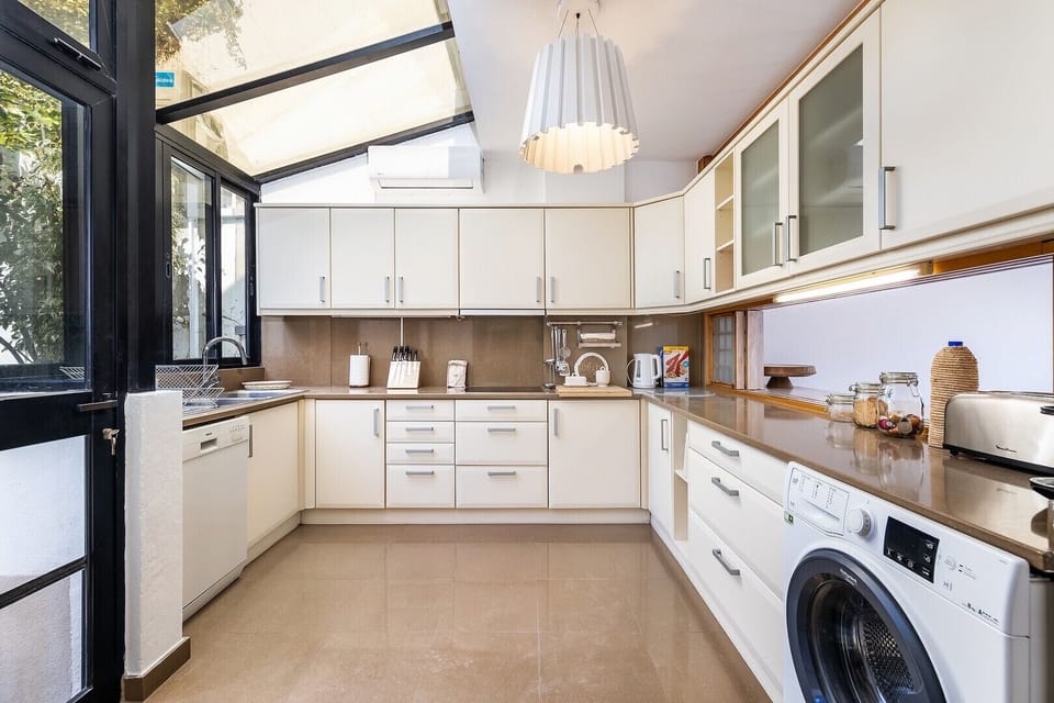 Fully equipped kitchen with modern equipment/machinery
