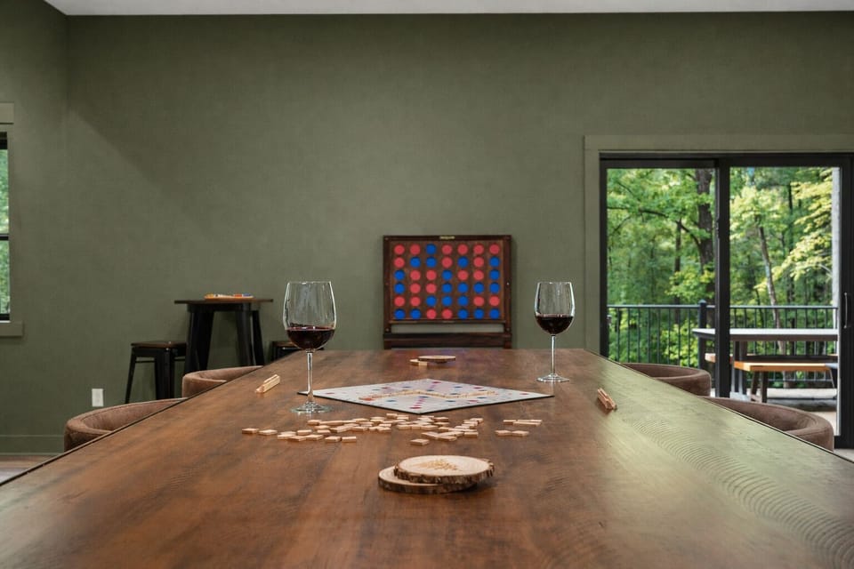 Pub table in the game room with lower level deck access.
