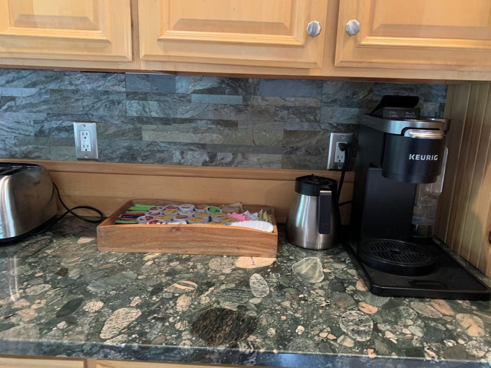 Keurig coffee by the cup or makes full pot. A few complimentary k-cups. 