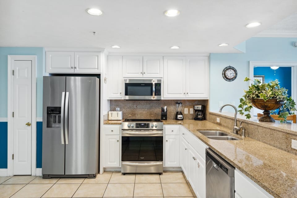 Well-equipped kitchen w/ stainless appliances & ample counter space for easy meal prep