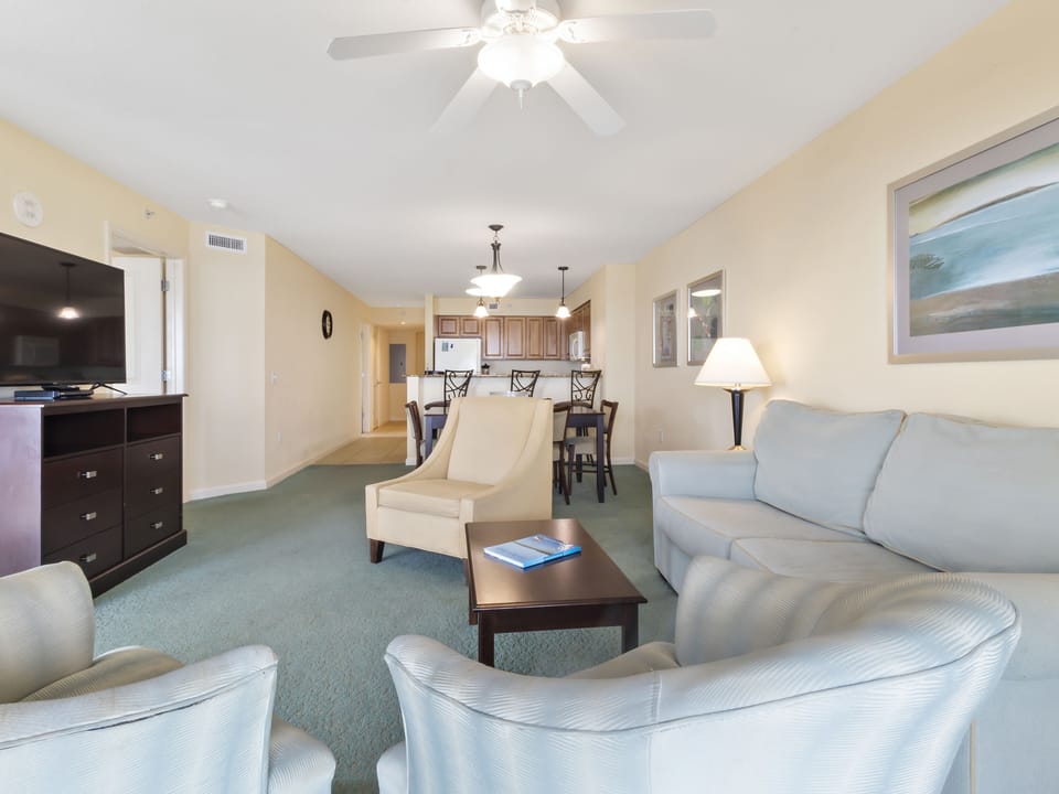 Relax in your spacious living room with plush seating, then gather around the dining table for memorable meals together.