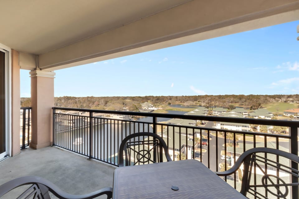 Step onto your private balcony and savor morning coffee with sweeping views of the landscape stretching to the horizon.