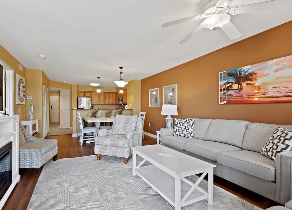 Sink into plush seating while enjoying open-concept living that flows seamlessly into your fully equipped kitchen and dining space.