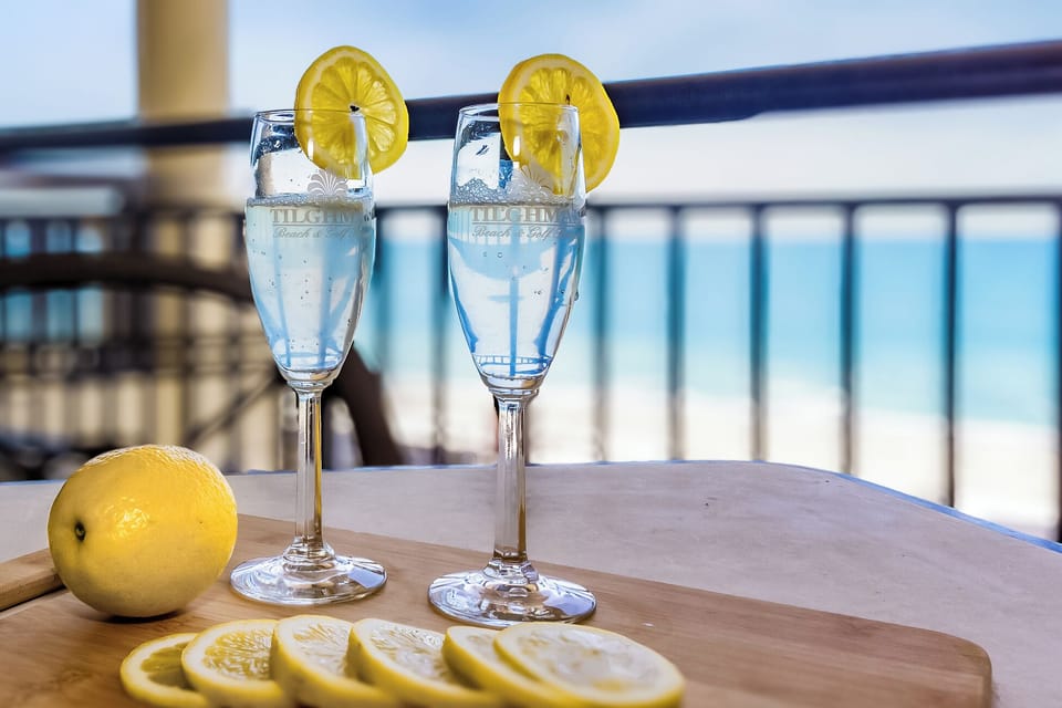 Sip refreshing drinks on your private balcony while savoring stunning ocean views and gentle sea breezes.