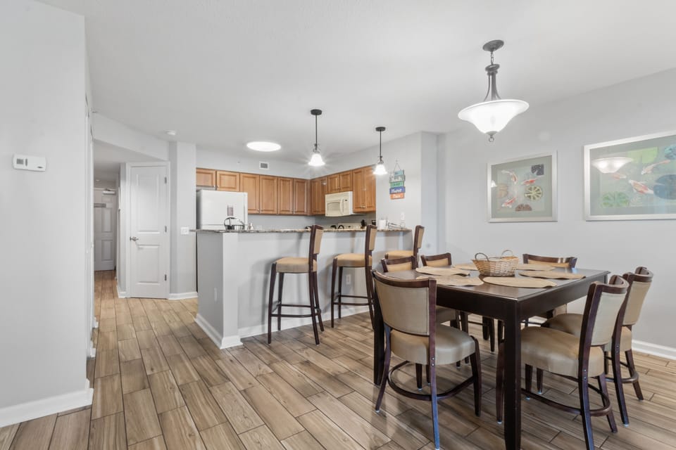 Your spacious dining area flows beautifully into the modern kitchen, perfect for gathering with loved ones over home-cooked meals.