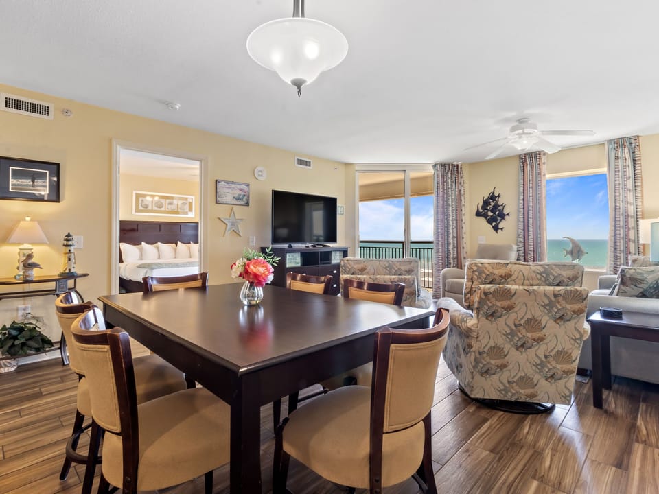 Gather around your spacious dining table with stunning ocean views as your backdrop, creating unforgettable memories with loved ones.