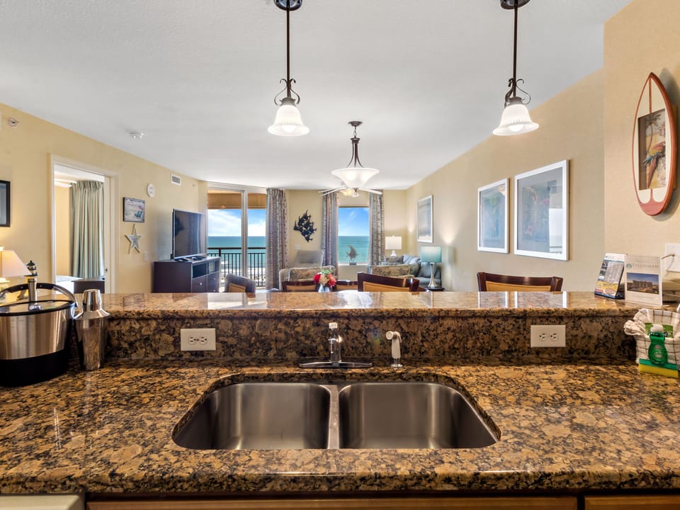 Cook with ocean views through your granite-topped kitchen, where meal prep becomes pure pleasure with the sea as your backdrop.