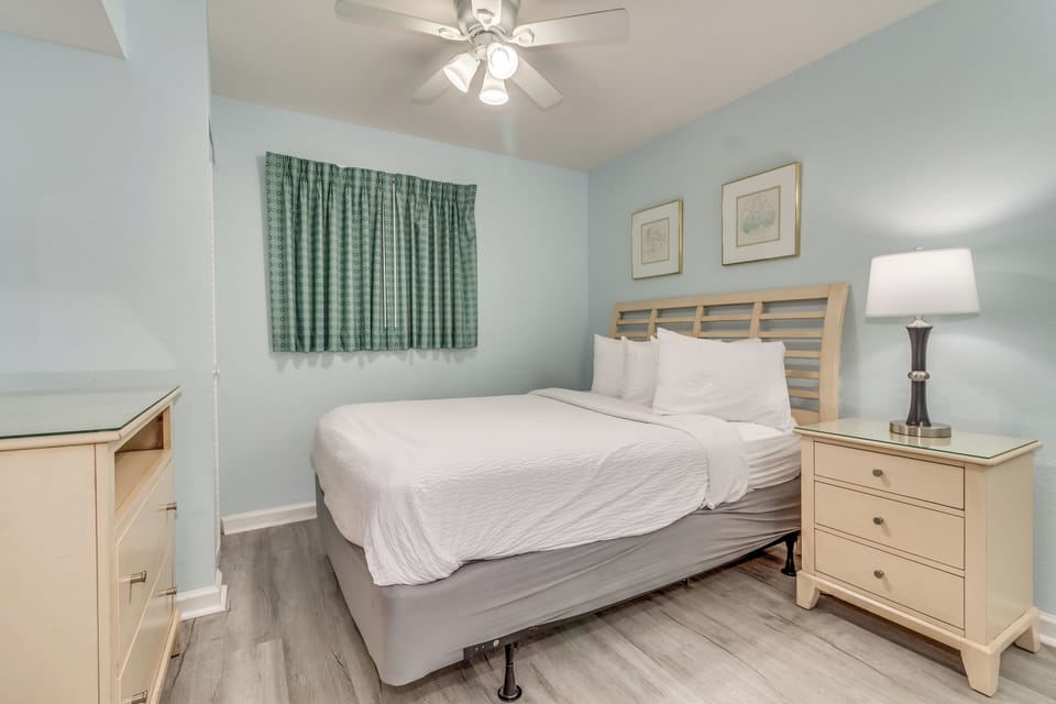 Drift into peaceful dreams in your cozy bedroom with soft linens, gentle lighting, and calming blue tones.