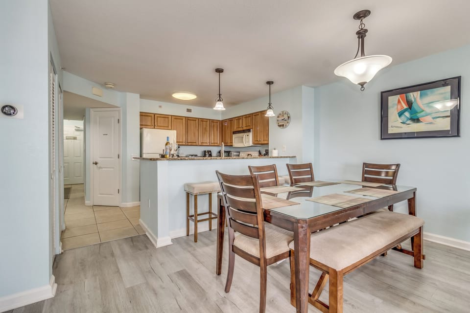 Gather around your spacious dining table for memorable meals, with a fully equipped kitchen featuring granite counters ready for your culinary adventures.