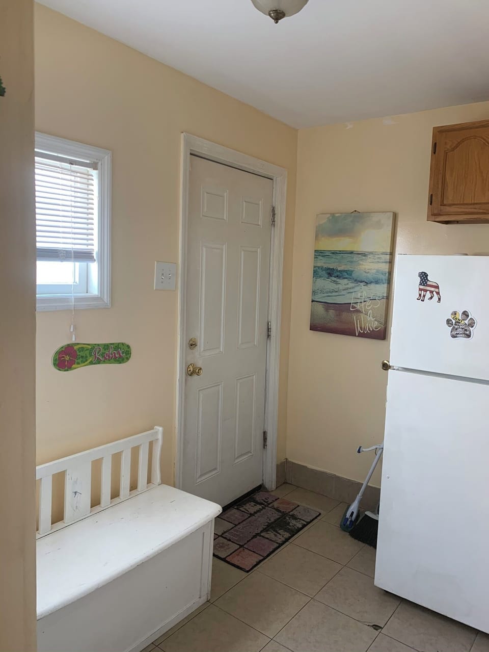 Refrigerator, back door to fenced in yard