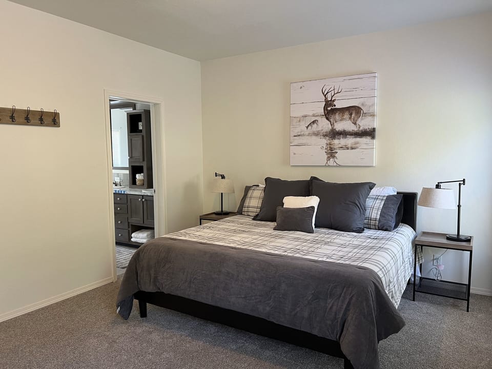 Spacious master suite, beautifully decorated, showing en-suite bathroom entrance