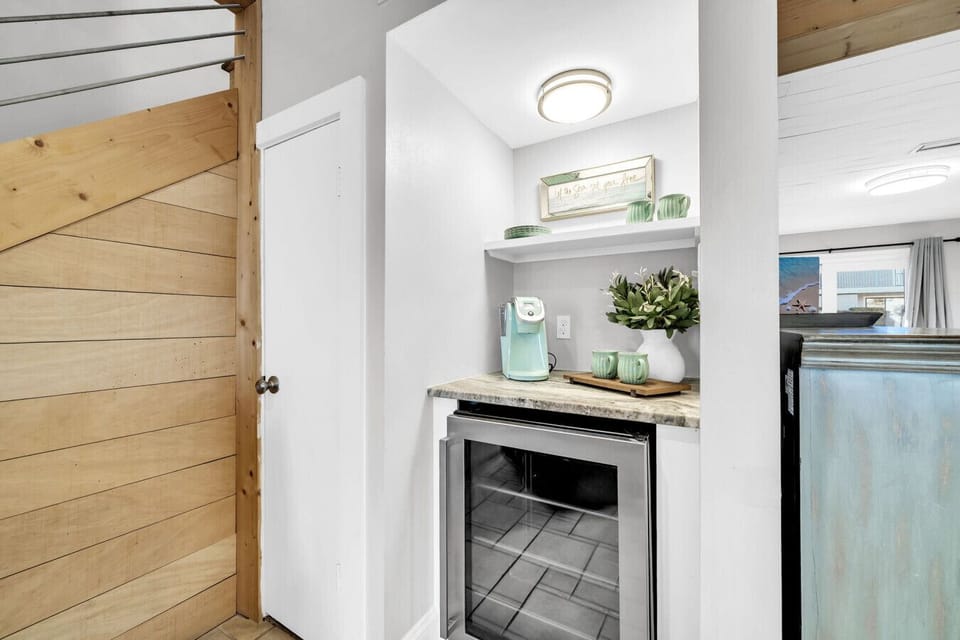 Use the wine fridge or coffee bar to wind down or get energized