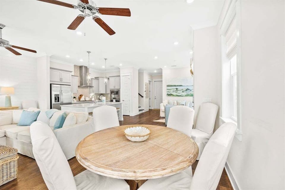A harmonious blend of dining and lounging, featuring elegant decor and a seamless layout.