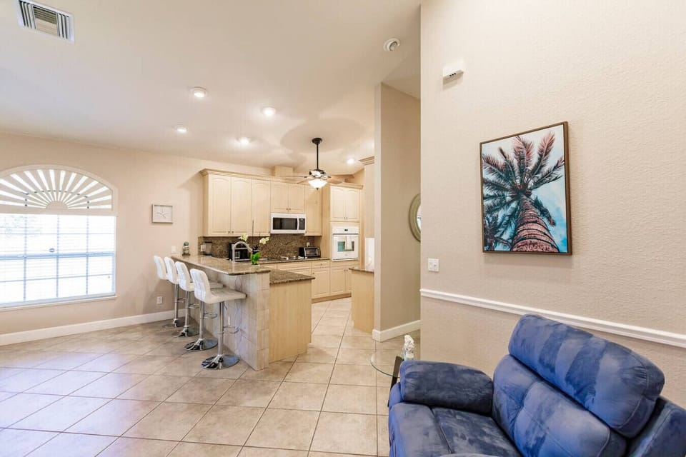 Enjoy a drink at the bar while someone is cooking up a storm or sit back and relax on the reclining sofa seat.