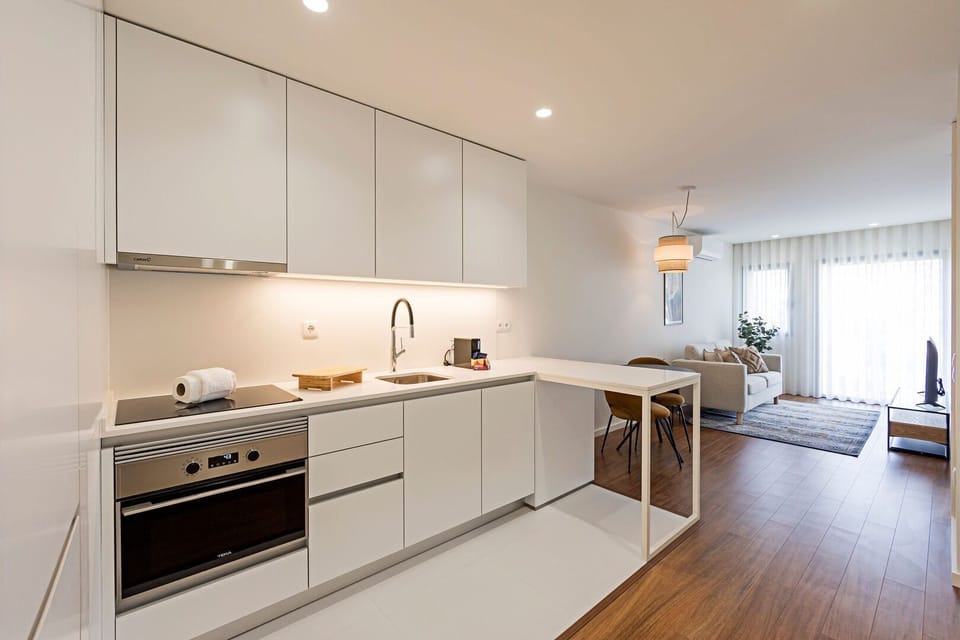 The kitchenette includes an electric kettle, an oven, a stove, Nespresso coffee machine, toaster and even a dishwasher #kitchen #lovelystay
