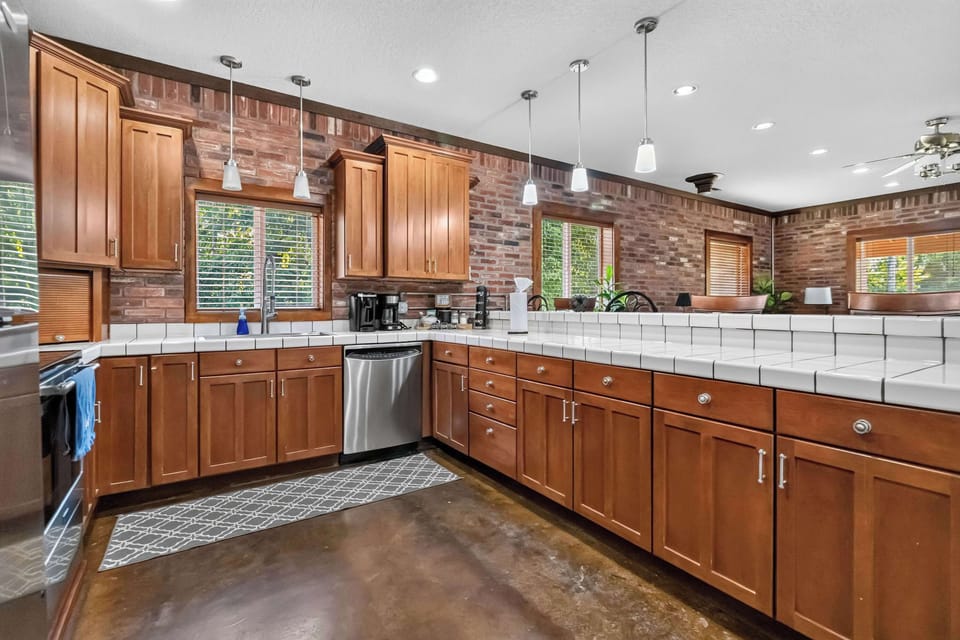 Large kitchen with extra counter space for preparation.