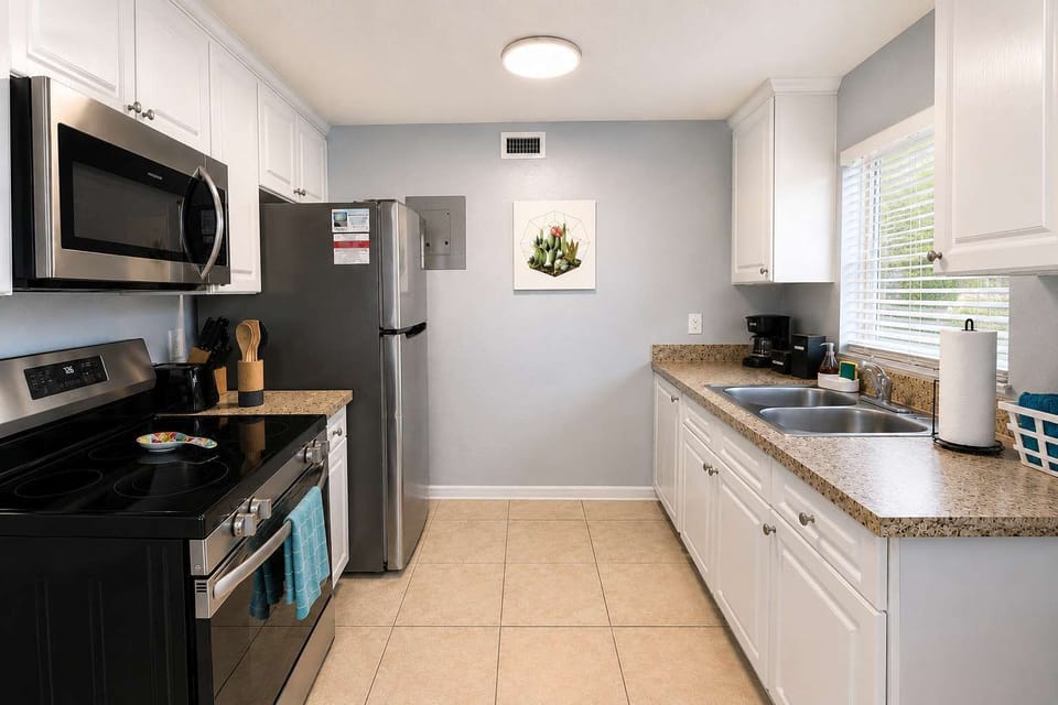 Bright and functional kitchen with everything needed for comfortable cooking and dining.