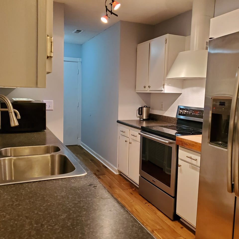 Galley Style: R/F, Stove/Oven, M/W, DW (Bosch Condensation); Washer/Dryer at end