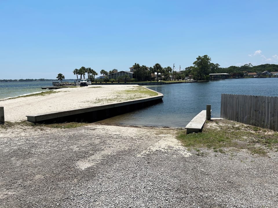 Small boat ramp and beach to West, 1200 feet from house.