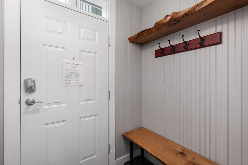 Mudroom entrance with storage