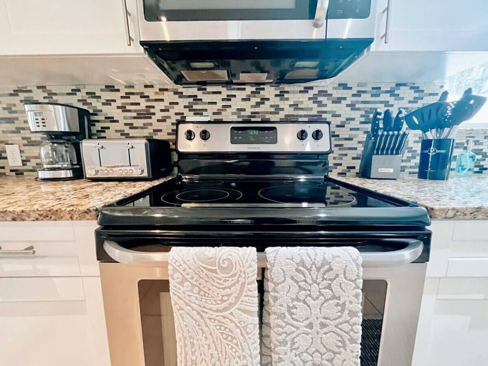 Awesome Stainless Steel Flattop Stove Paired w/ High End Cooking Utensils