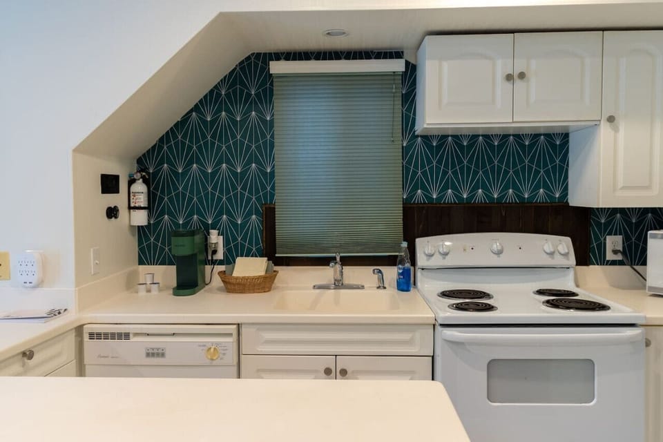 Kitchen with stove and dishwasher.