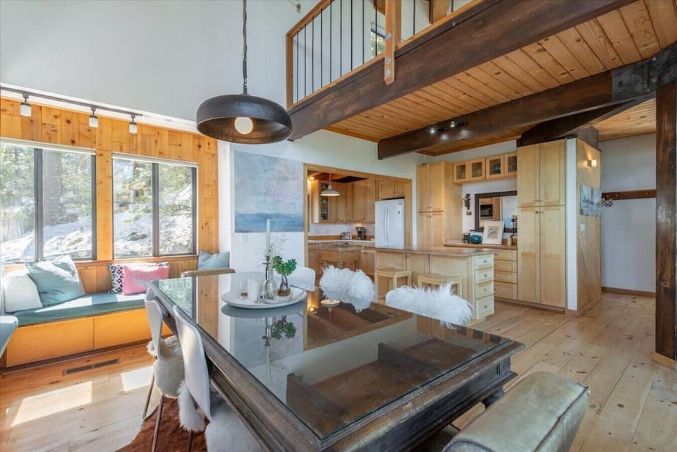 Dining area with built-in window seats.