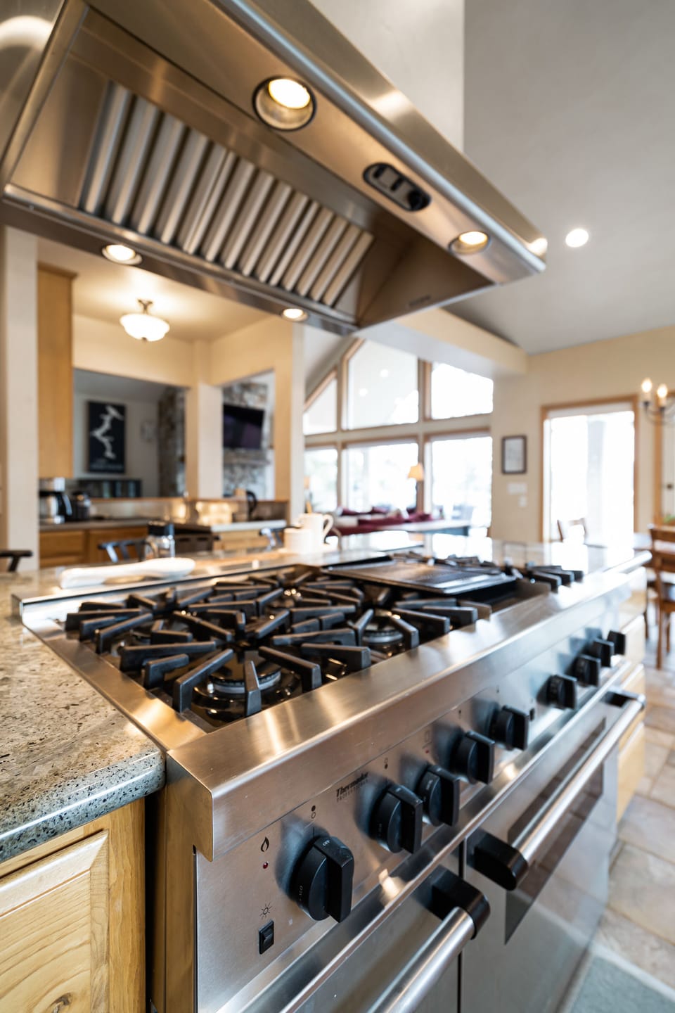 This Thermidor range provides several burners and two ovens below. 